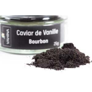 Détail des grains noirs de caviar de vanille Bourbon pour pâtisserie.
